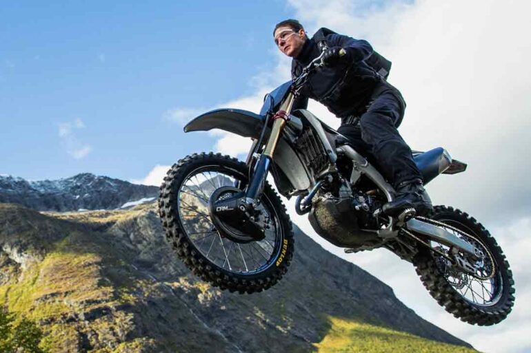 Tom Cruise performing the bike stunt from Mission: Impossible - Dead Reckoning Part One