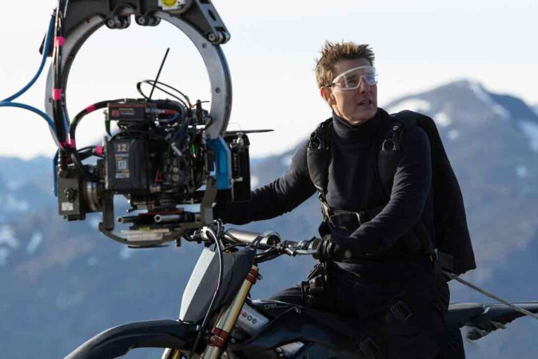 Tom Cruise filming the bike jump stunt on the set of Mission: Impossible - Dead Reckoning Part One
